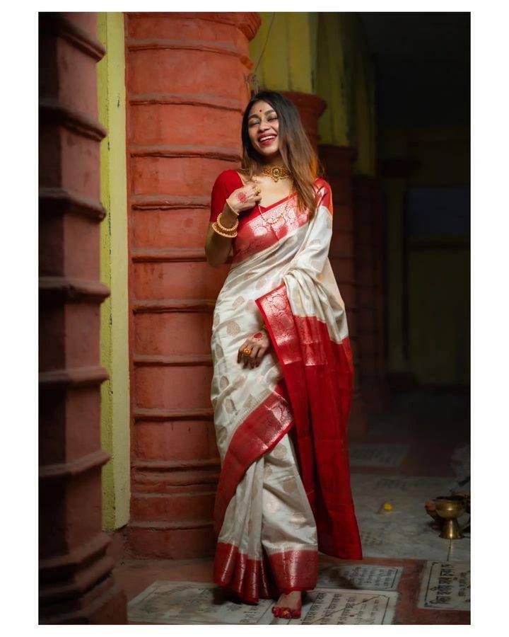 Moiety Off-white and Red Zari Woven Banarasi Saree With Blouse