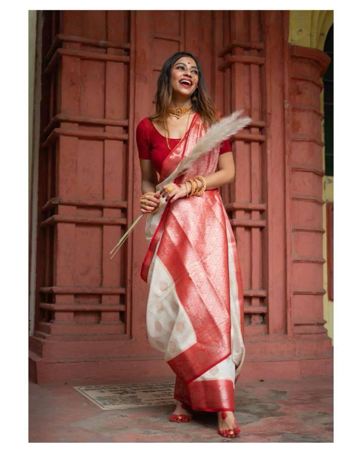 Moiety Off-white and Red Zari Woven Banarasi Saree With Blouse