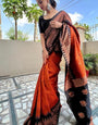 Outstanding Black and Orange Zari Woven Banarasi Saree With Blouse