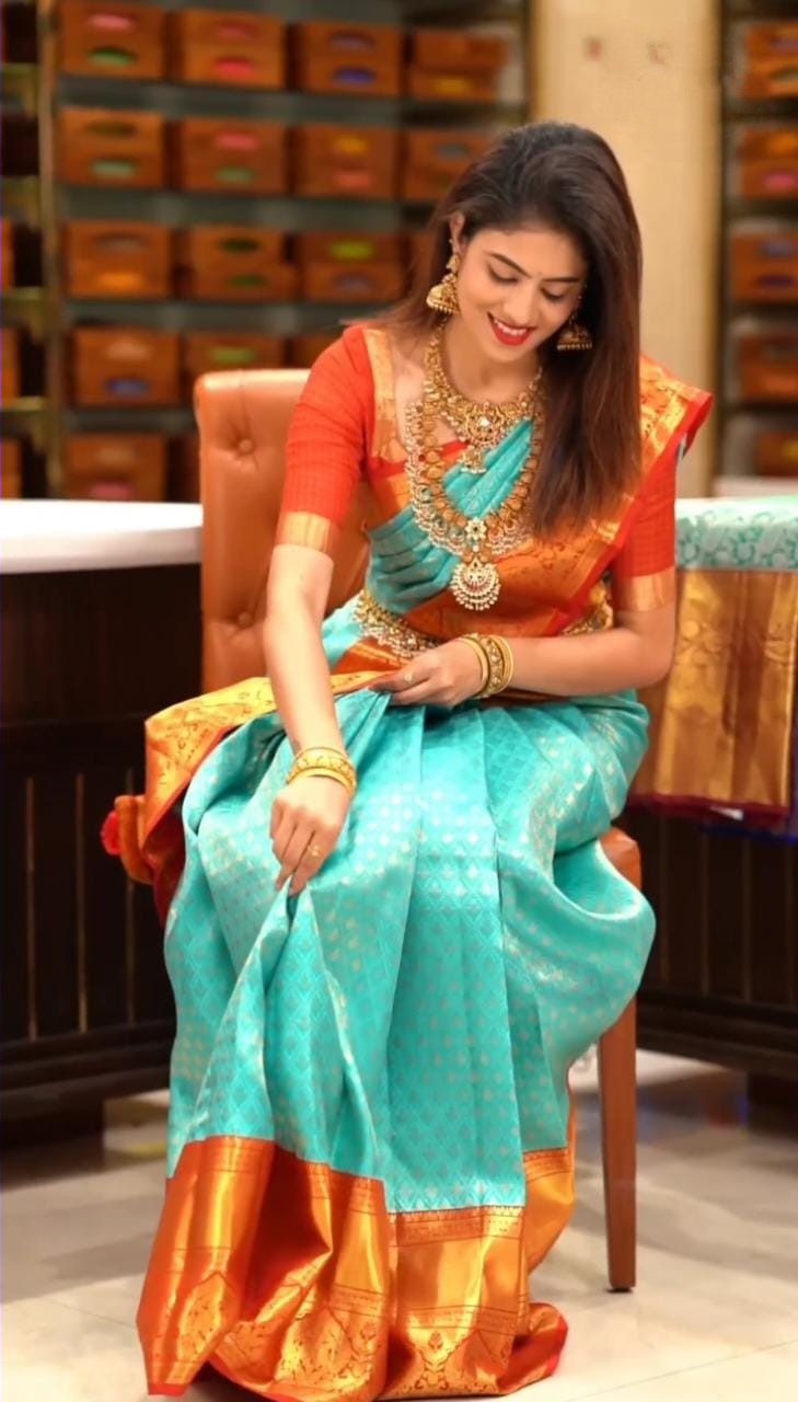 Angelic Turquoise Soft Silk Saree with Ethnic Blouse Piece