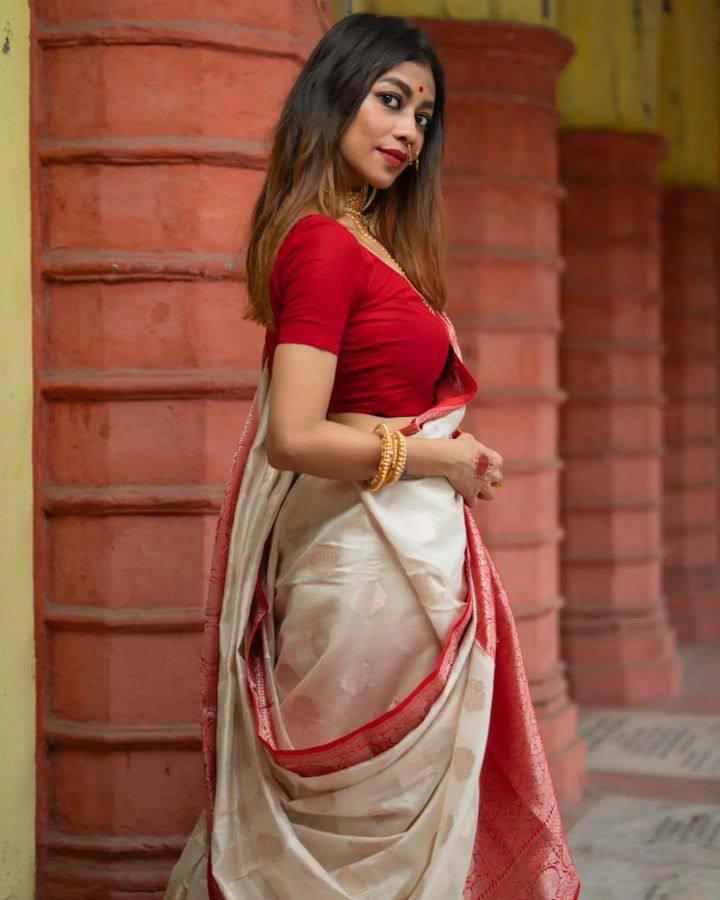 Moiety Off-white and Red Zari Woven Banarasi Saree With Blouse