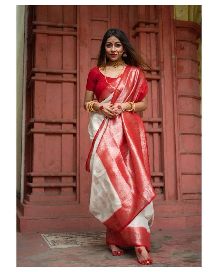 Moiety Off-white and Red Zari Woven Banarasi Saree With Blouse