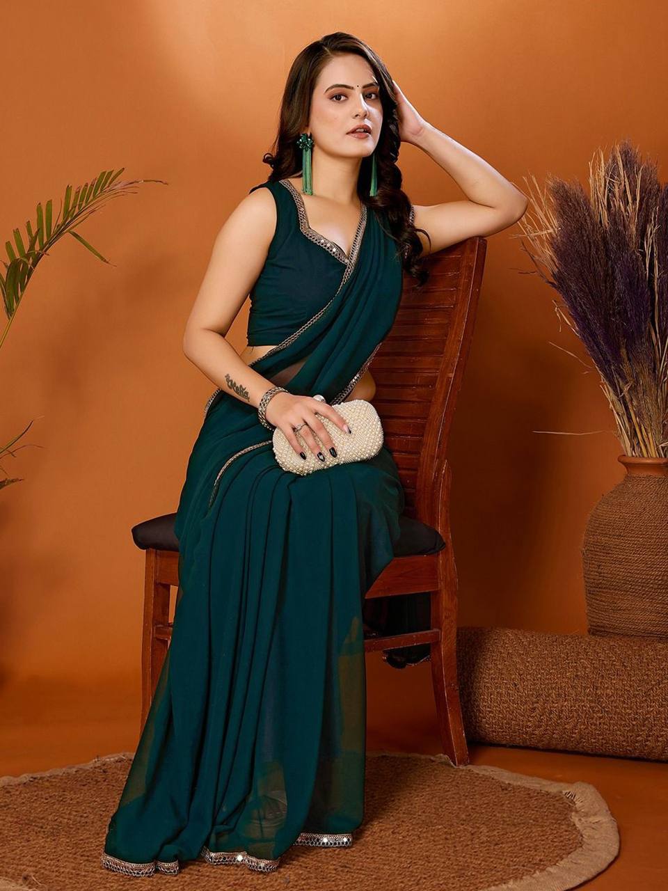 Prominent Georgette Saree With Mirror Lace Border